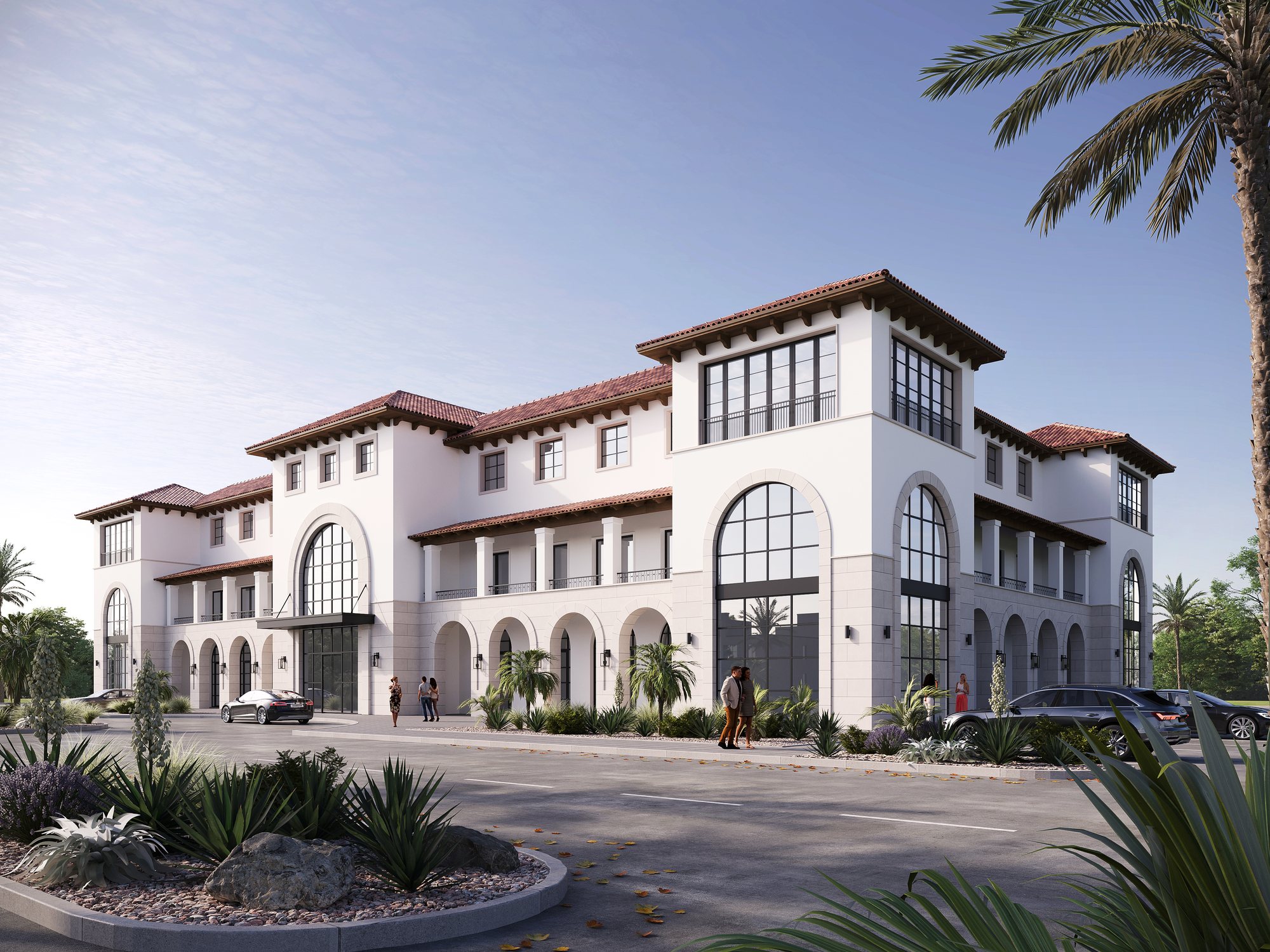 Spanish Revival architecture at Jardines at Cimarron with arched windows and a red tile roof